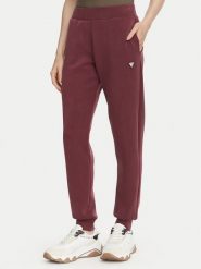 Guess Spodnie dresowe V4YB08 KCAY2 Bordowy Regular Fit. Czerwone spodnie dresowe damskie Guess, xl, z aplikacjami, z dresówki. Za 344.99 zł.