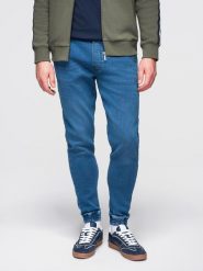 Spodnie męskie jeansowe joggery ze ściagaczem w pasie - niebieskie V1 - Rozmiar: M. Niebieskie spodnie materiałowe męskie Ombre Clothing, m, z aplikacjami, z bawełny, retro. Za 239.99 zł.