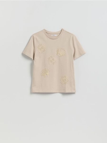 T-shirt z aplikacją - kremowy. Białe t-shirty damskie Reserved, l, z aplikacjami, z bawełny, bez kołnierzyka. Za 69.99 zł.