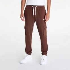 SPODNIE MĘSKIE DRESOWE ELLESSE SPORTOWE BRĄZOWE. Brązowe spodnie sportowe męskie Ellesse, m, bez wzorów, z bawełny, na fitness i siłownię. Za 163.96 zł.