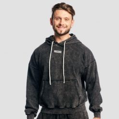 Bluza męska z kapturem oversize z efektem sprania czarna Aura. Czarne bluzy męskie GYMBEAM, m, bez wzorów, z bawełny, z kapturem, na fitness i siłownię. Za 139.90 zł.