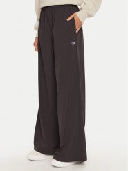 Champion Spodnie dresowe 117472 Czarny Wide Leg. Czarne spodnie dresowe damskie Champion, xs, bez wzorów, z dresówki. Za 189.99 zł.