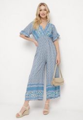 Niebieski Bawełniany Kombinezon z Gumkami w Pasie i Kopertowym Dekoltem Zapinany z Tyłu na Guziki Lorrania. Niebieskie sukienki damskie Born2be, na co dzień, l, bez wzorów, z bawełny, eleganckie, bez kołnierzyka, bez ramiączek, mini, kopertowe. Za 49.99 zł.