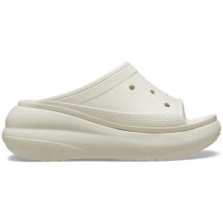 Klapki damskie Crocs Crush Slide Bone Os. Białe klapki damskie Crocs, bez wzorów, z materiału, sportowe, bez obcasa. W wyprzedaży za 177.10 zł.