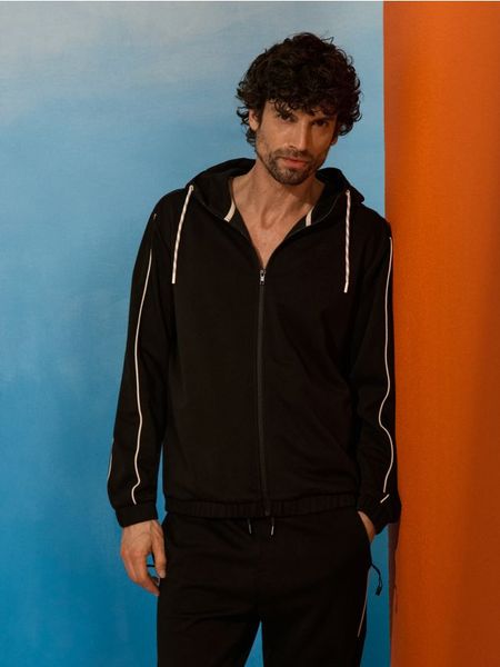 Rozpinana bluza z kapturem - czarny. Czarne bluzy męskie Sinsay, l, bez wzorów, z kapturem. Za 79.99 zł.