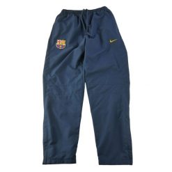 Second life - Nike spodnie dresowe męskie FC Barcelona - Jak nowy. Niebieskie spodnie sportowe męskie Nike, l, bez wzorów, z dresówki, do biegania. Za 170.36 zł.