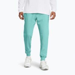 Spodnie męskie Under Armour Rival Fleece Joggers. Niebieskie buty sportowe męskie Under Armour, bez zapięcia, na fitness i siłownię. Za 209.99 zł.