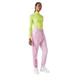 Spodnie damskie Lacoste. Czerwone spodnie dresowe damskie Lacoste, s, z aplikacjami, z dresówki. Za 387.00 zł.