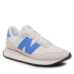 Sneakersy New Balance. Niebieskie trampki i tenisówki chłopięce New Balance, bez wzorów, bez zapięcia. Za 289.99 zł.