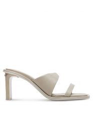 Calvin Klein Klapki Heel Slide 70 Lth HW0HW02072 Beżowy. Brązowe klapki damskie Calvin Klein, bez wzorów, ze skóry, bez obcasa. Za 529.99 zł.
