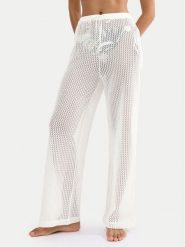 Triumph Spodnie plażowe Beach MyWear Crochet 10226465 Biały Relaxed Fit. Białe spodnie materiałowe damskie Triumph, bez wzorów, z syntetyku. Za 159.99 zł.