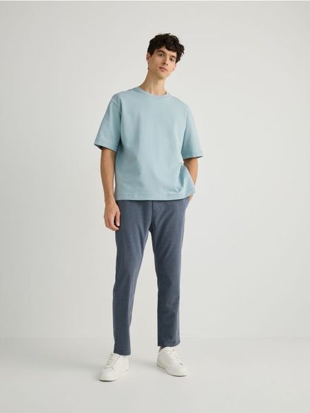 Bawełniany t-shirt boxy - morski. Zielone t-shirty męskie Reserved, l, bez wzorów, z bawełny, bez kołnierzyka. W wyprzedaży za 39.99 zł.