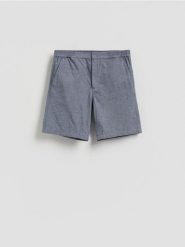 Lniane szorty regular fit - jasnoniebieski. Niebieskie szorty męskie Reserved, l, bez wzorów, z tkaniny. Za 159.99 zł.