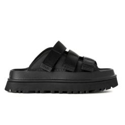 Damskie japonki klapki W GOLDENGLOW SLIDE. Czarne klapki damskie UGG, bez wzorów, z materiału, bez obcasa. Za 509.75 zł.