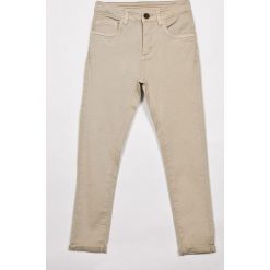 Blukids - Spodnie dziecięce 134-164 cm. Spodnie materiałowe dla chłopców marki Blukids. W wyprzedaży za 59.90 zł.