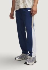 Spodnie Mężczyzna UNDER ARMOUR UA RIVAL WOVEN CB PANTS. Niebieskie spodnie sportowe męskie Under Armour, l, bez wzorów, na fitness i siłownię. Za 361.45 zł.