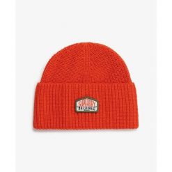 Czapka z dzianiny Superdry Trucker. Brązowe czapki i kapelusze męskie Superdry., bez wzorów, z dzianiny. Za 126.05 zł.