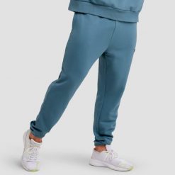 Spodnie męskie fitness regular niebieskie Unity. Niebieskie spodnie sportowe męskie GYMBEAM, m, bez wzorów, z bawełny, na fitness i siłownię. Za 118.90 zł.