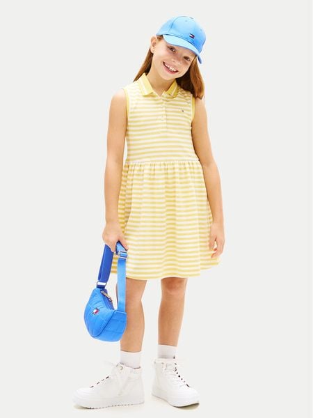 Tommy Hilfiger Sukienka codzienna KG0KG08486 Żółty jasny Regular Fit. Żółte sukienki dla dziewczynek Tommy Hilfiger, bez wzorów, z bawełny, bez ramiączek. Za 190.99 zł.