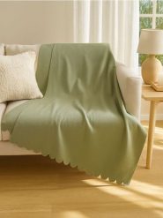 Koc - zielony. Zielone kocyki dla dzieci Sinsay. Za 12.99 zł.