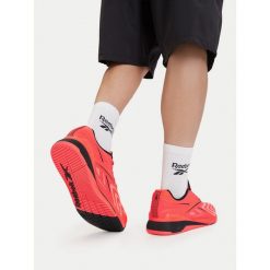 Buty na siłownię Reebok. Czerwone buty sportowe męskie Reebok, bez zapięcia, na fitness i siłownię. Za 599.99 zł.