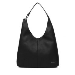 Torebka Calvin Klein. Czarne torebki do ręki damskie Calvin Klein, bez wzorów, klasyczne, bez dodatków. Za 1,099.00 zł.
