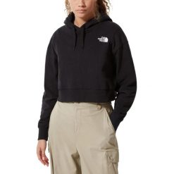 Bluza damska The North Face Trend Crop. Czarne bluzy damskie The North Face, xs, bez wzorów, sportowe, bez kołnierzyka, bez ramiączek, z kapturem. W wyprzedaży za 322.55 zł.