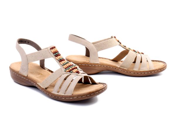 RIEKER 60851-62 beige, sandały damskie. Brązowe sandały damskie Rieker, bez wzorów, bez obcasa, bez zapięcia. Za 254.92 zł.