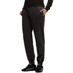 Spodnie damskie Puma ESS Elevated Comfort Wash Sweatpants 01. Czarne spodnie materiałowe damskie Puma, bez wzorów. Za 182.99 zł.