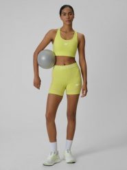 4F Legginsy krótkie treningowe damskie - żółte XL. Żółte legginsy sportowe damskie 4f, xl, bez wzorów, z materiału, z podwyższonym stanem, krótkie, na fitness i siłownię. Za 99.99 zł.