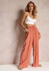 Różowe Brzoskwiniowe Szerokie Spodnie z Wiskozy i Gumką w Pasie Abyga. Czerwone spodnie sportowe damskie Renee, l, bez wzorów, z jeansu, tenisowe. Za 79.99 zł.