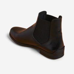 Sztyblety jeździeckie Fouganza 500 skórzane. Czarne botki męskie FOUGANZA, bez wzorów, ze skóry, bez zapięcia. Za 199.99 zł.