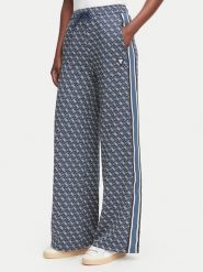 Guess Spodnie dresowe V6YB27 K5181 Granatowy Relaxed Fit. Niebieskie spodnie dresowe damskie Guess, s, z aplikacjami, z dresówki. Za 426.99 zł.