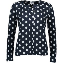 Koszulka w kolorze granatowo-białym. T-shirty damskie Be Yourself, w kropki, z długim rękawem. W wyprzedaży za 100.95 zł.