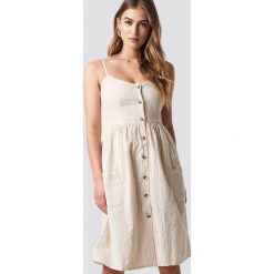 MANGO Sukienka Salvia - Beige. Sukienki damskie marki Mango. Za 141.95 zł.