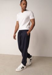 Granatowe Spodnie Dresowe z Bawełną ze Ściągaczami Hailise. Niebieskie spodnie sportowe męskie Born2be, m, bez wzorów, z bawełny. Za 89.99 zł.