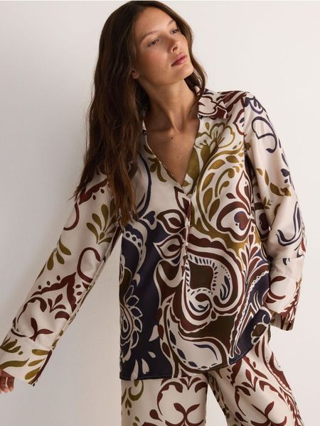 Wzorzysta koszula - wielobarwny. Koszule damskie Reserved, l, bez wzorów, z tkaniny, bez kołnierzyka, bez ramiączek. W wyprzedaży za 49.99 zł.