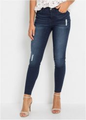 Jeansy o kroju skinny ze średnim stanem, krótsza nogawka. Niebieskie jeansy damskie bonprix. Za 127.99 zł.