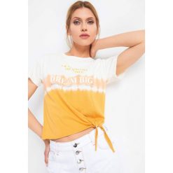 T-shirt z wiązaniem. Żółte t-shirty damskie marki Orsay, bez wzorów, z bawełny, bez kołnierzyka. Za 29.99 zł.