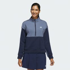 Kurtka z suwakiem do połowy długości. Niebieskie kurtki damskie Adidas, bez wzorów, z materiału, sportowe, bez kołnierzyka, bez ramiączek, bez kaptura. Za 349.00 zł.