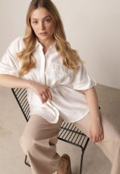 Biała Nietoperzowa Koszula Safari z Bawełną z Wiązaniem w Talii Tierona. Białe bluzki damskie Born2be, l, bez wzorów, z bawełny, biznesowe, bez kołnierzyka, bez ramiączek. Za 89.99 zł.