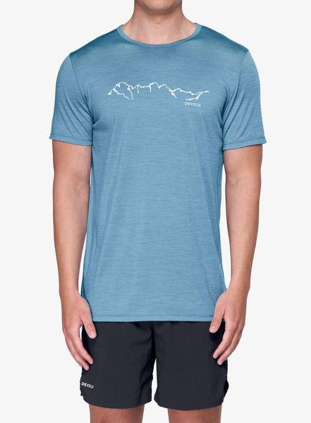 Koszulka merino Devold Active Skyline Tee. Niebieskie koszulki sportowe męskie Devold, l, bez wzorów, z materiału, bez kołnierzyka, bez ramiączek, outdoorowe. Za 351.65 zł.