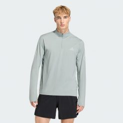 Bluza adi365 Iconic 1/2 Zip. Zielone bluzy sportowe męskie Adidas, bez wzorów, bez kaptura, na fitness i siłownię, climacool (adidas). Za 219.00 zł.