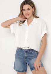 Biała Koszula z Krótkim Rękawem Natenna. Białe bluzki damskie Born2be, na lato, bez wzorów, z jeansu, eleganckie, bez kołnierzyka, bez ramiączek. Za 59.99 zł.