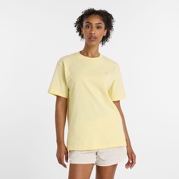 Koszulka damska New Balance WT41501PRC – żółta. Żółte koszulki sportowe damskie New Balance, s, bez wzorów, z materiału, bez kołnierzyka, bez ramiączek. Za 119.99 zł.