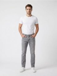 Jeansy skinny z efektem sprania - kremowy. Białe jeansy męskie Sinsay. Za 49.99 zł.