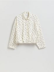 Koszula w groszki - złamana biel. Koszule damskie Reserved, l, bez wzorów, z bawełny, bez kołnierzyka, bez ramiączek. Za 149.99 zł.