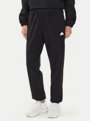 Adidas Spodnie dresowe City Escape IT8814 Czarny Regular Fit. Czarne spodnie dresowe damskie Adidas, s, bez wzorów, z dresówki. Za 329.99 zł.