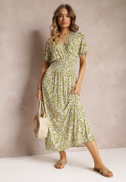 Jasnozielona Rozkloszowana Sukienka Maxi w Kwiaty z Gumką w Pasie Aeyana. Zielone sukienki damskie Renee, m, bez wzorów, bez kołnierzyka, bez ramiączek, maxi, kopertowe. Za 69.99 zł.