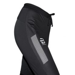 Damskie spodnie do biegania Daehlie Sportswear Winter Run. Czarne spodnie materiałowe damskie DAEHLIE, l, bez wzorów, z elastanu, z standardowym stanem. Za 508.50 zł.
